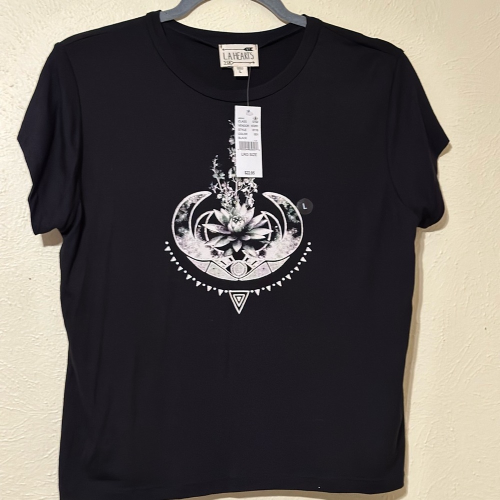 66. NWT T shirt black and white with a lotus flower.
